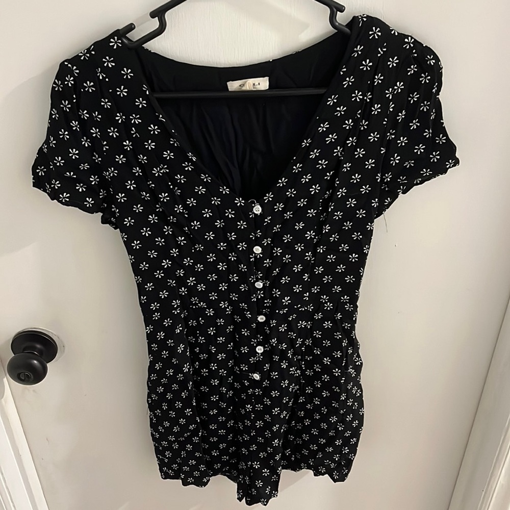 Black flower romper with tie back and pockets